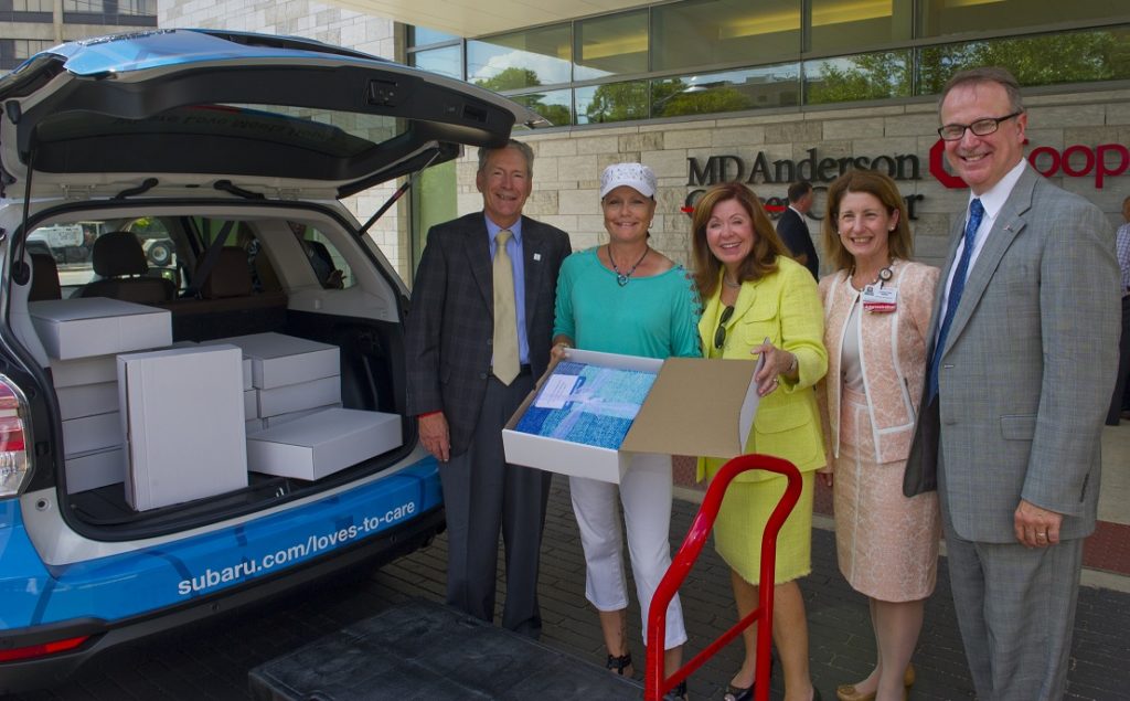 subaru and lls donate blankets to md anderson cooper