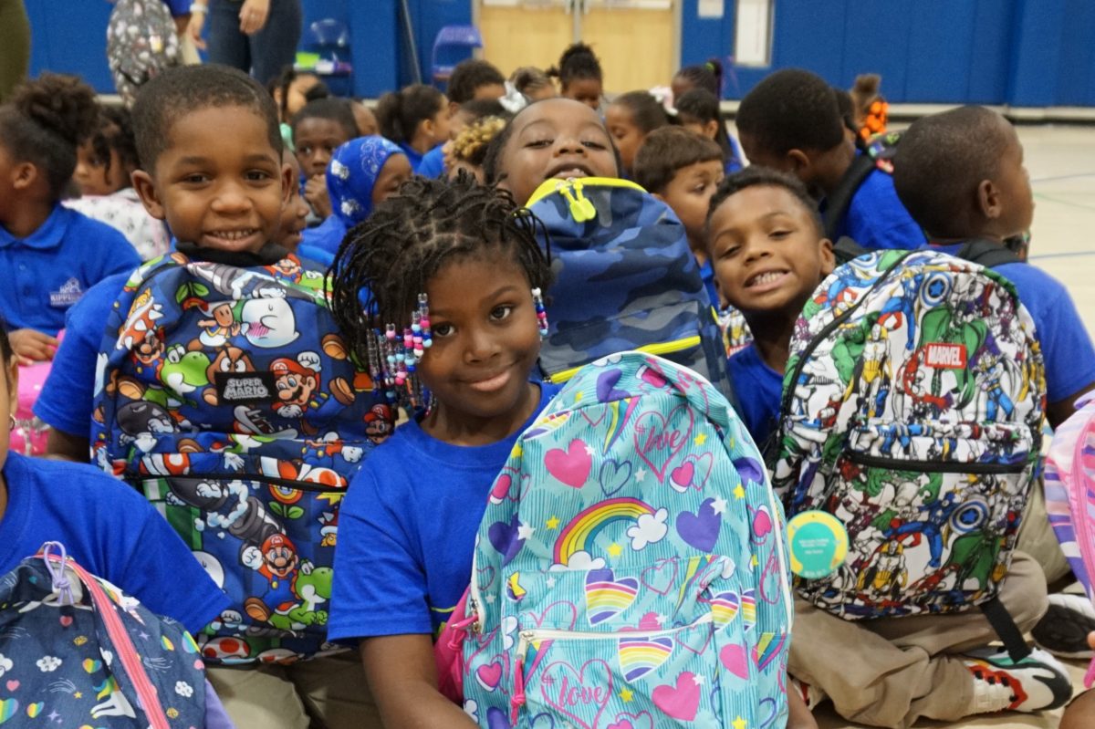 Cooper University Health Care Employees and The Cooper Foundation Donate Backpacks, School