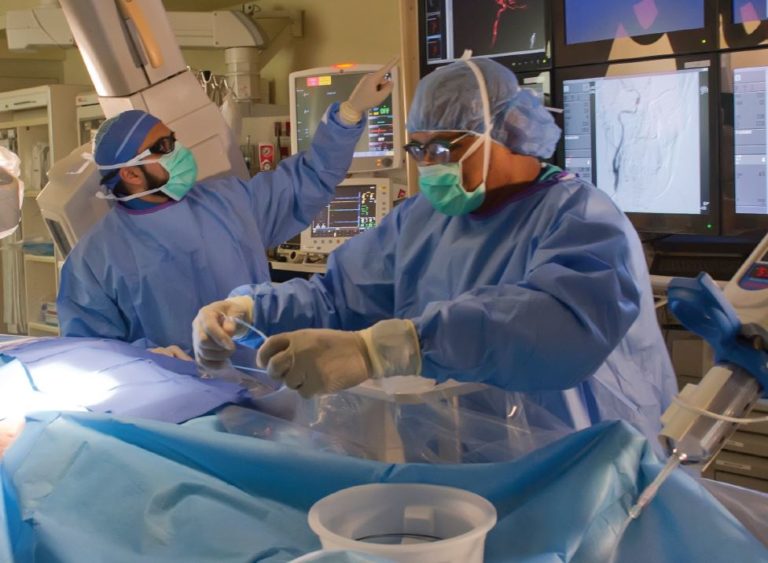 Hamza A. Shaikh, MD, Co-Director, Neurointerventional Surgery, performs a thrombectomy on a stroke patient in the Cooper Catheterization Laboratory.
