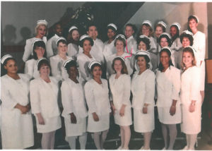 Maribel Brickhouse, RN, (front row, third from right), with her graduating class.